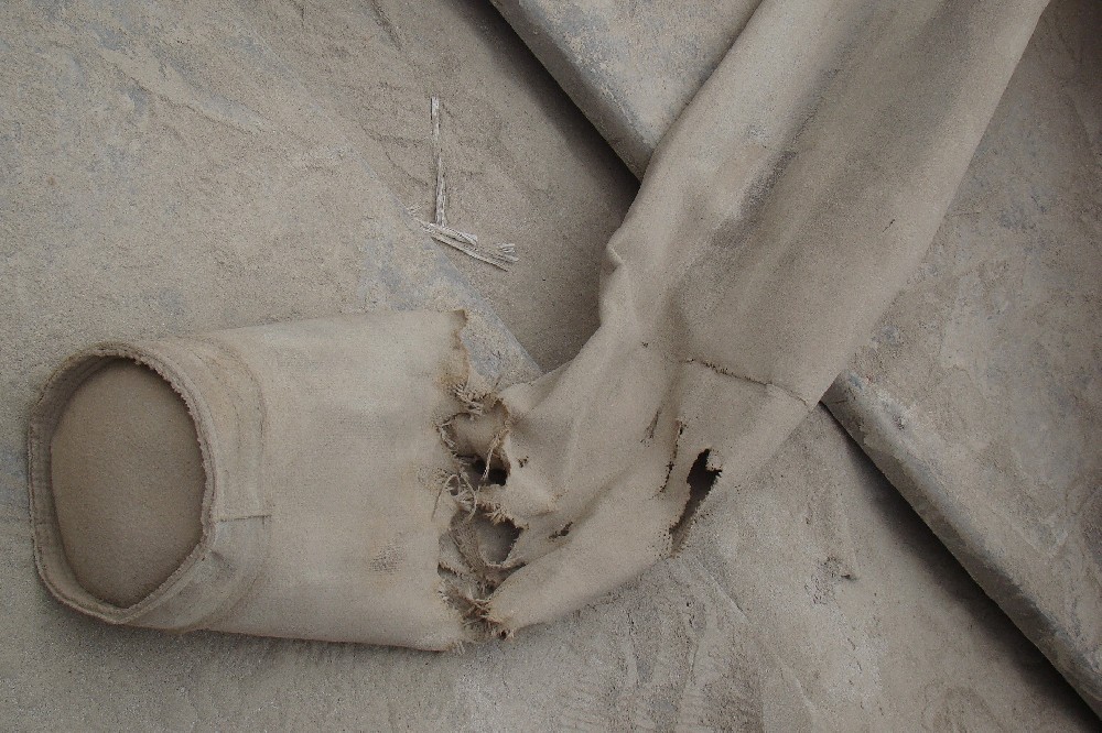 如何处理破损的除尘布袋？